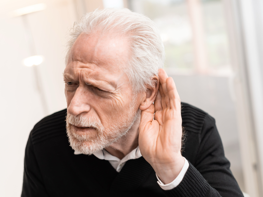 Patient learning about sensorineural, conductive, and mixed types of hearing loss at Advanced Hearing Technology in Naples, FL